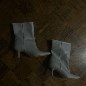 Grey leather pointed heel boots